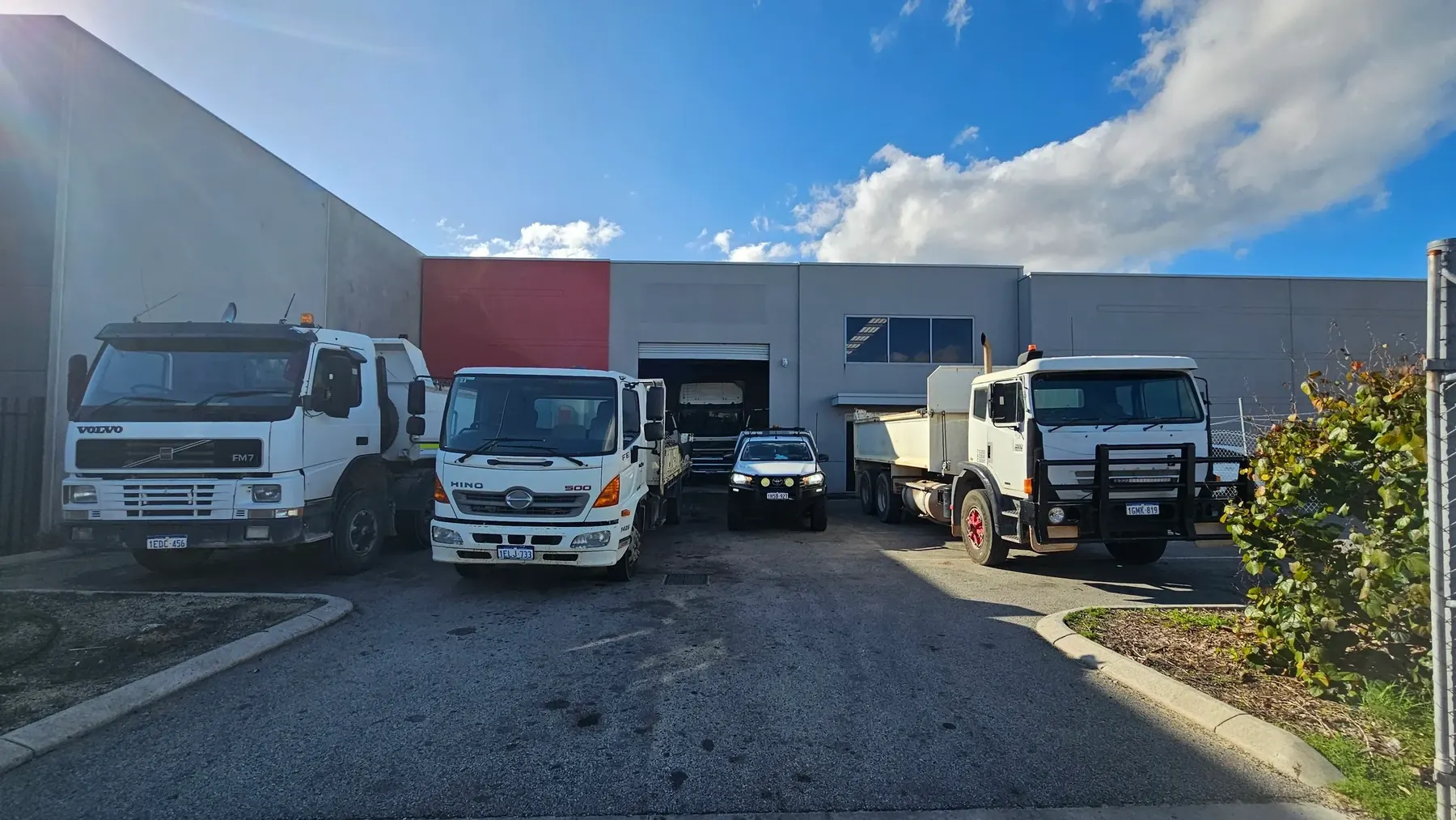 Trucks and a Shanno&rsquo;s service ute in at the yard
